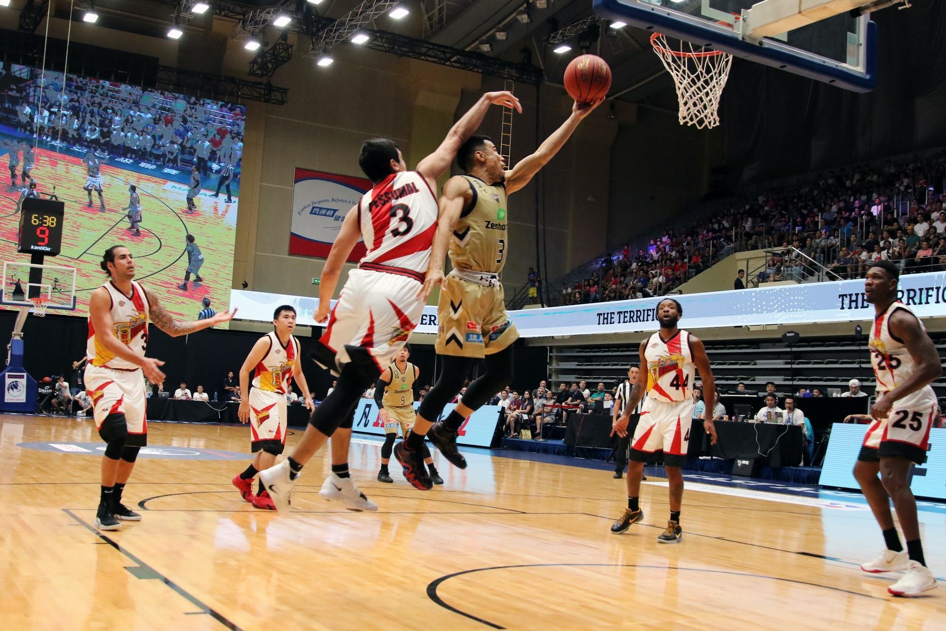 Wearing basketball shoes on the court