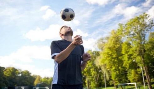 How to juggle a soccer ball?